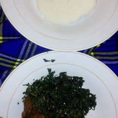 A picture of Wet fry liver with sukuma and ugali.