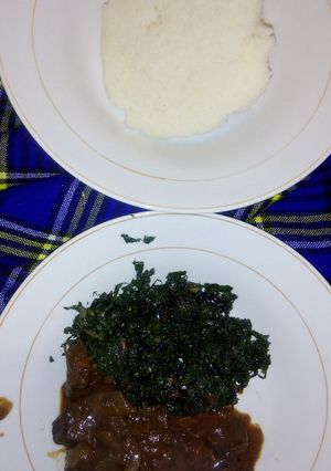 A picture of Wet fry liver with sukuma and ugali.