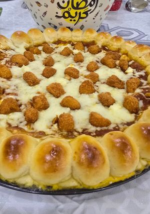 صورة لوصفة بيتزا🍕 محشيه الاطراف 🍕🍕