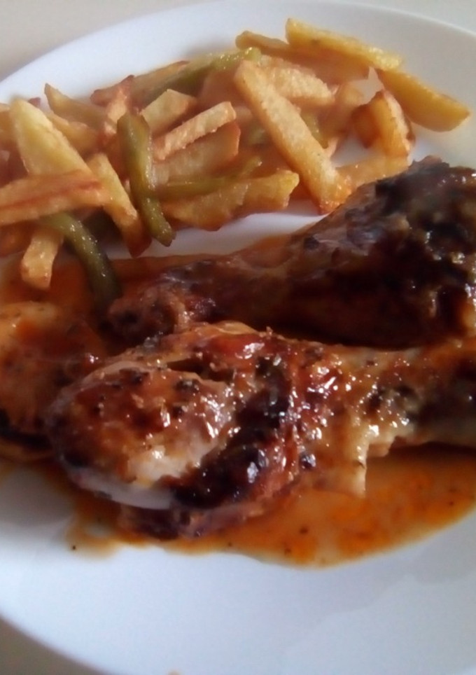 Una foto de Muslos de pollo asados