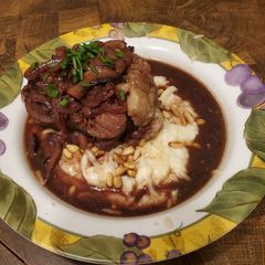 A picture of Brad's red wine braised ox tail w/ cauliflower puree.