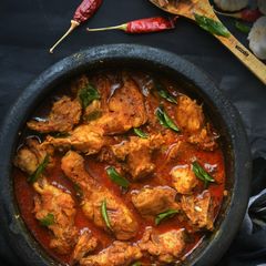 A picture of Chicken Ghee Roast curry.