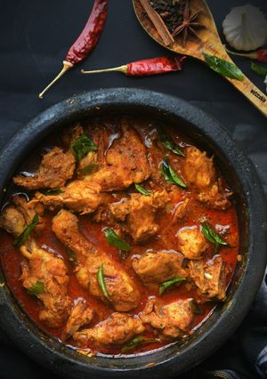 A picture of Chicken Ghee Roast curry.
