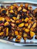 Pommes de terre sautées aux poivrons et oignon rouge