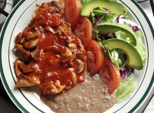 Una foto de Chuletas en salsa de tomate con chipotle