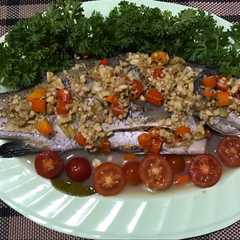 A picture of Thai Steamed fish with lime and garlic.
