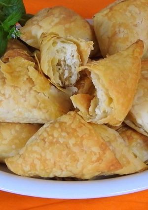 A picture of Mini Triangles Filled with Haloumi, Kasseri & Sunflower Seeds.