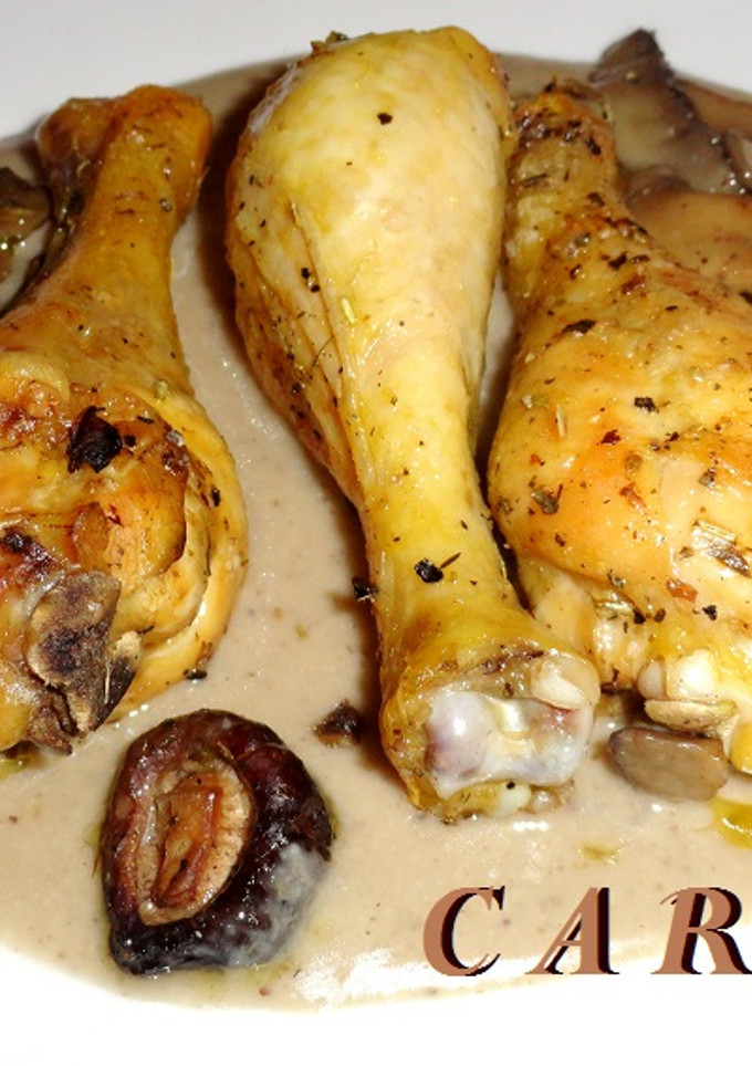 Una foto de Muslos de pollo con salsa de setas