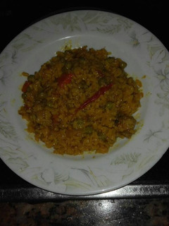 Una foto de Arroz con carne de cerdo adobada