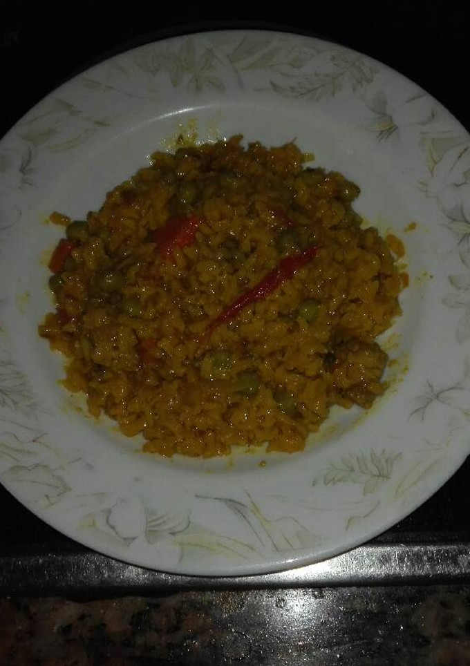 Una foto de Arroz con carne de cerdo adobada