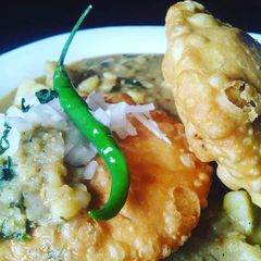 A picture of Kachori & ALOO KI SABZI.