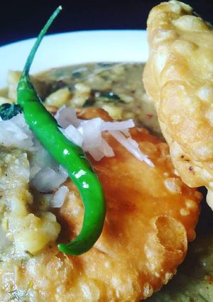 A picture of Kachori & ALOO KI SABZI.