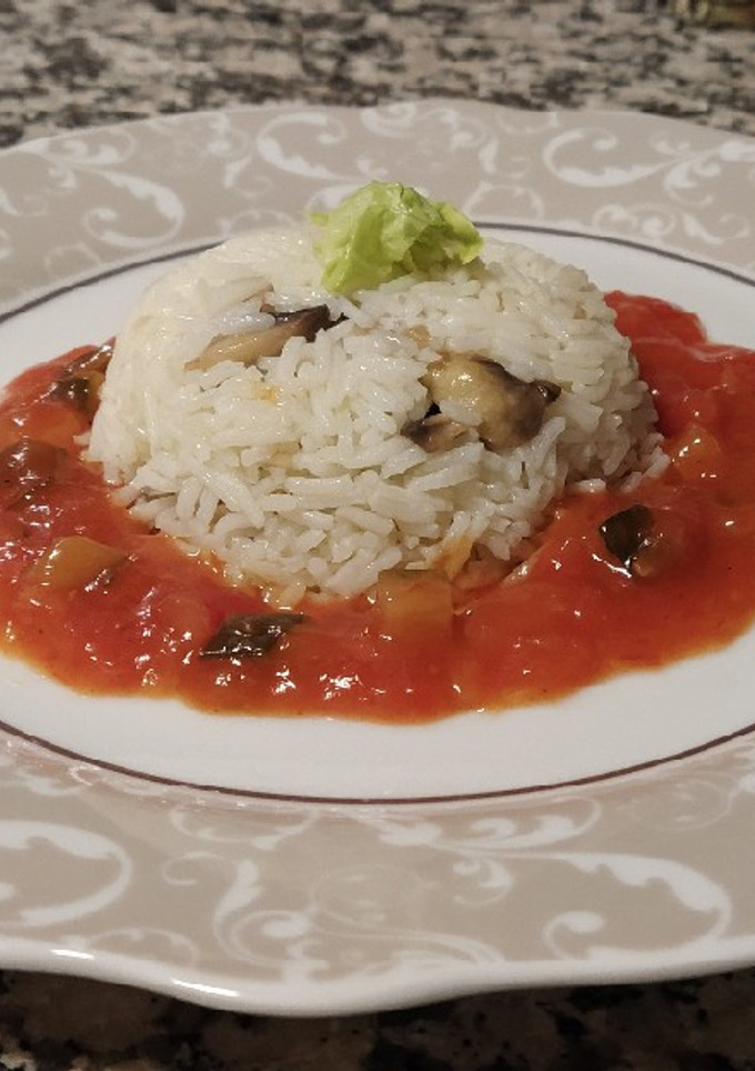 Una foto de Arroz a la cubana con champiñones