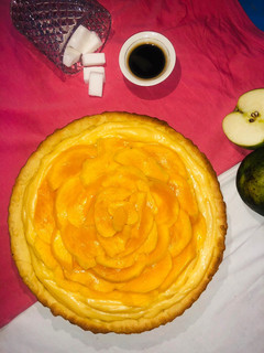 A picture of Mango Tart with Pastry Cream.