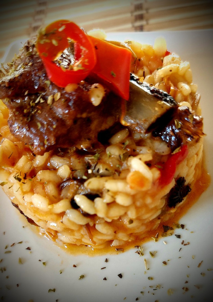 Una foto de Arroz con costilla y camagrocs