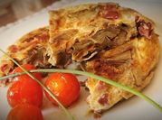 Una foto de alcachofas con jamón
