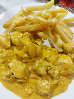 Una foto de Pollo al curry