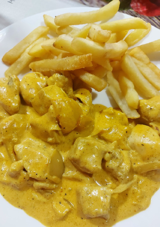 Una foto de Pollo al curry