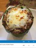 Shaved beef stuff pepper with white Queso cheese