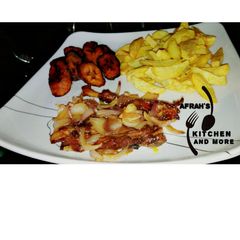 A picture of Fried Irish potatoes,plantain and oven baked chicken.