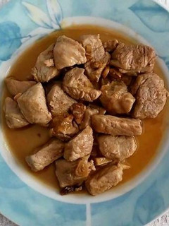 Una foto de Lomo al ajillo