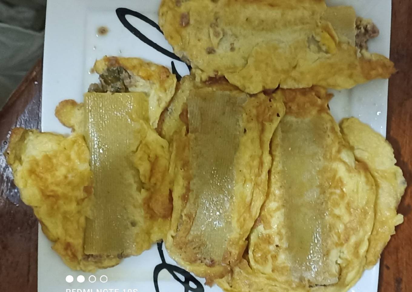 Canelones con relleno de Carne molida envueltos en huevo