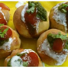 A picture of Stuffed Baked Bati Chaat.