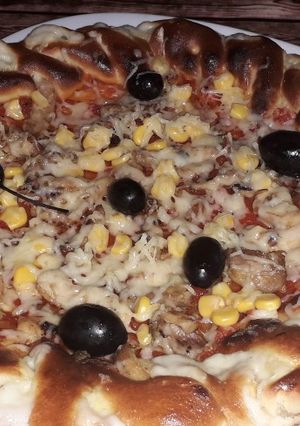 صورة لوصفة بيتزا بعجينة رائعة