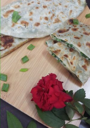 A picture of Jingalov hats Armenian herb stuffed flatbread .