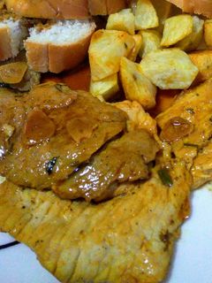 Una foto de Lomo de cerdo marinado en cerveza y perejil!