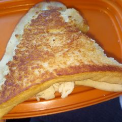 A picture of Samosa shaped bread.