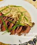 Ostrich steak with red wine and mushroom sauce
