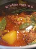 Costillas picantes con patatas, alcachofas y judias