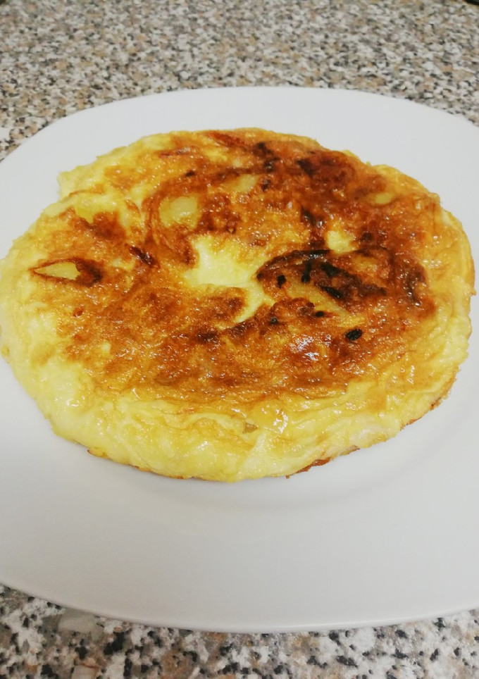 Una foto de Tortillita de patatas y cebolla