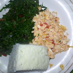 A picture of Ugali kale and scrambled eggs.