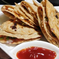 A picture of Roti Pizza Wrap.