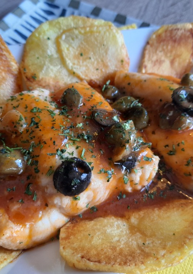 Una foto de Cazón a la pizzaiola