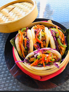 A picture of Tofu Shiitake Mushrooms Vegan Bao Buns (Chinese Steamed Buns).