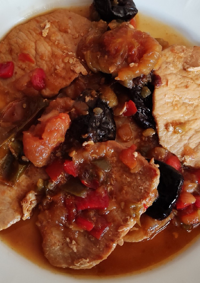 Una foto de Lomo en salsa