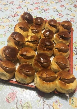 Una foto de Miguelitos o pan de leche relleno