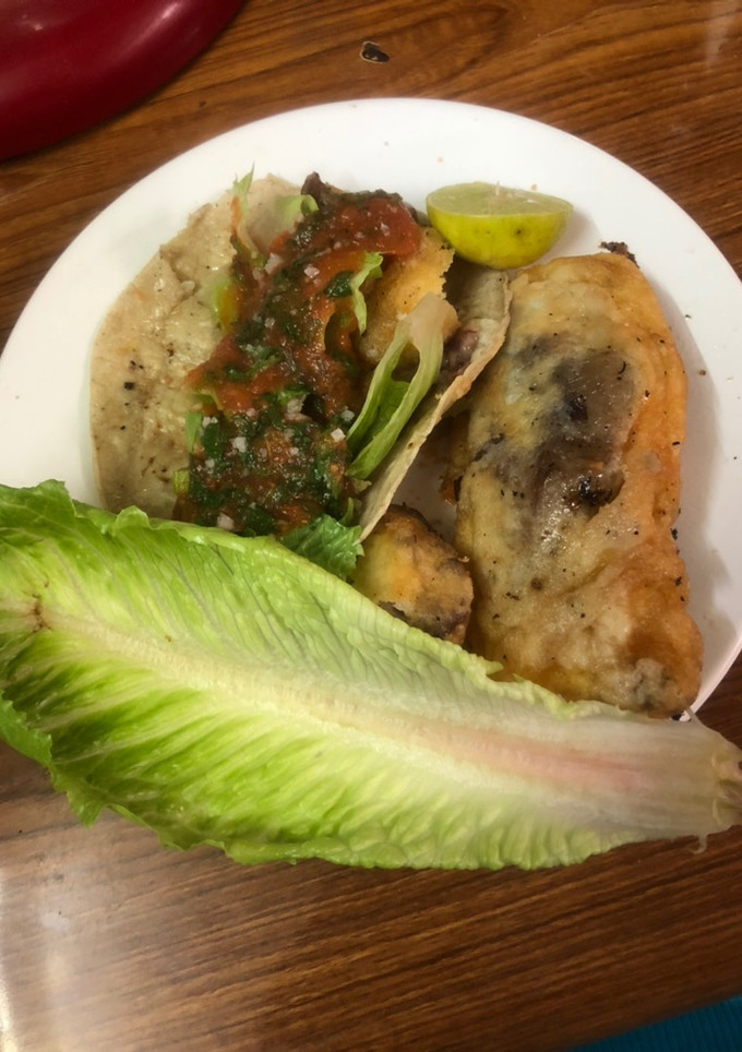 Una foto de Patitas de puerco capeadas