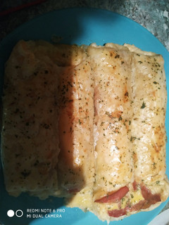Una foto de Hojaldre relleno de queso y bacon