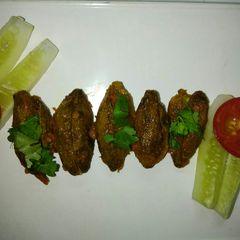 A picture of Steamed Besan Karela.