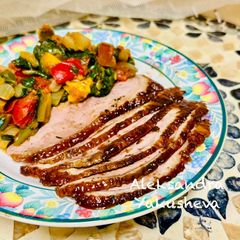 A picture of Duck crown in berry glaze.