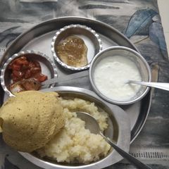 A picture of Khichdi platter khichdi ke char ya Ghee Papad Dahi Achar.