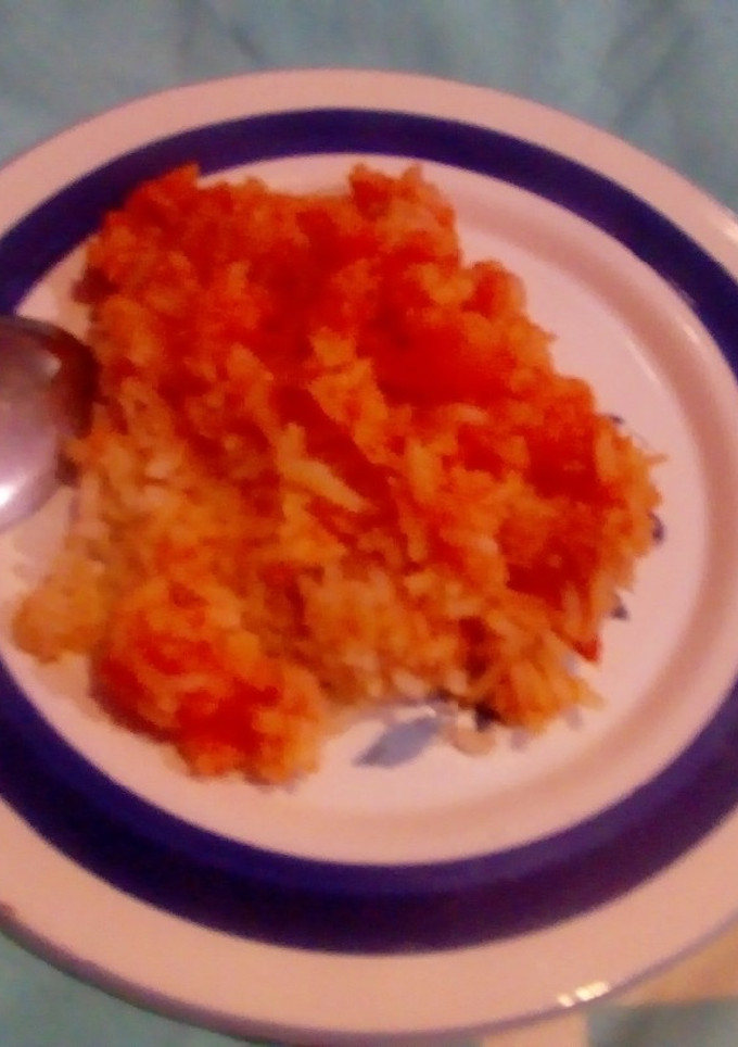 Una foto de Arroz rojo con zanahorias