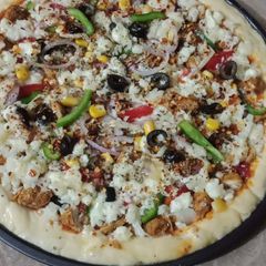 A picture of Chicken corn pizza.