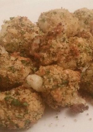 A picture of Basil-Garlic Baked Cheese Curds.