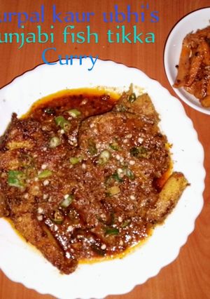 A picture of Punjabi fish tikka curry🐠🍅🧅🌶️🌿.
