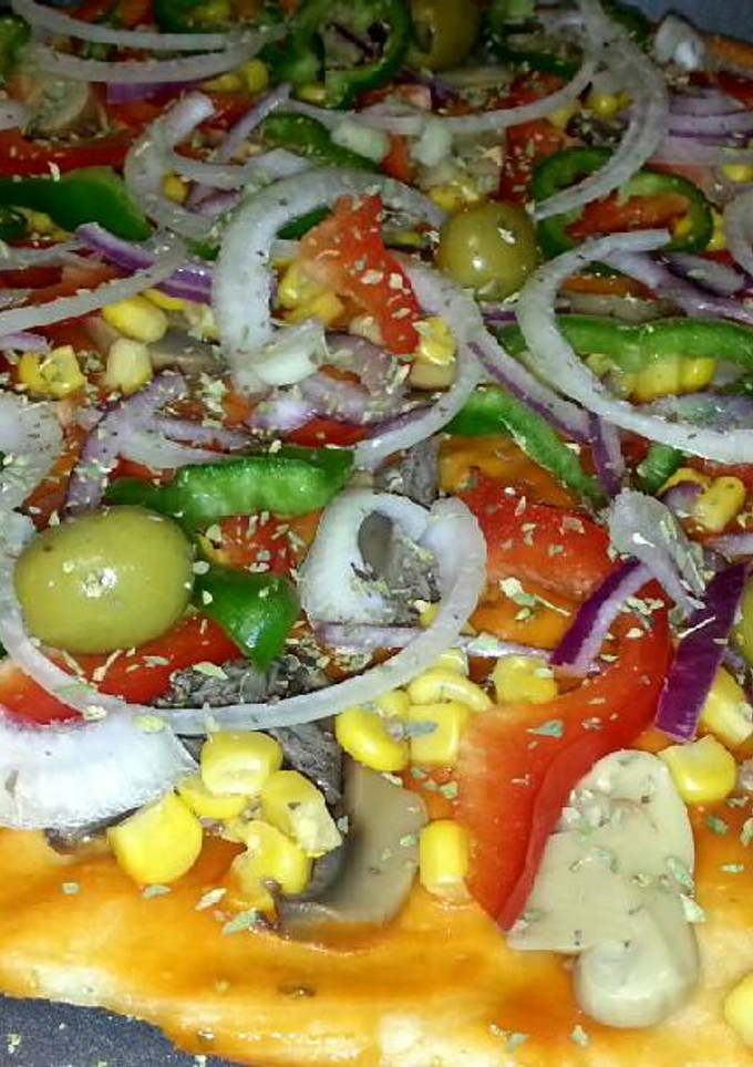 Una foto de Pizza vegana